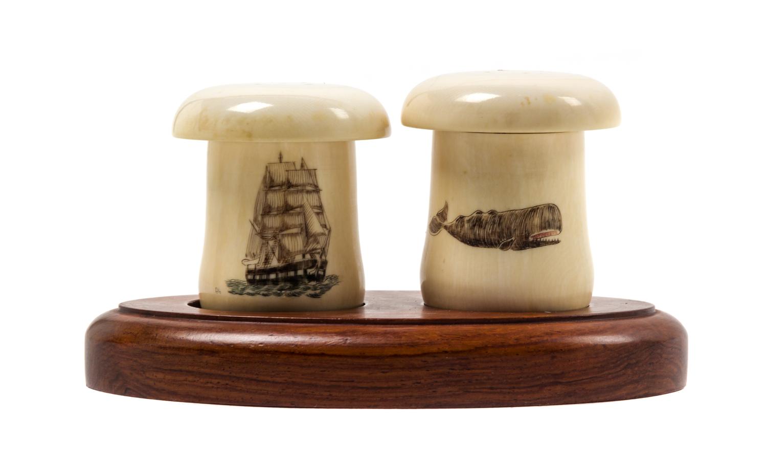 A Scrimshaw Salt and Pepper Shaker Height 2 1/4 inches. — 20TH CENTURY