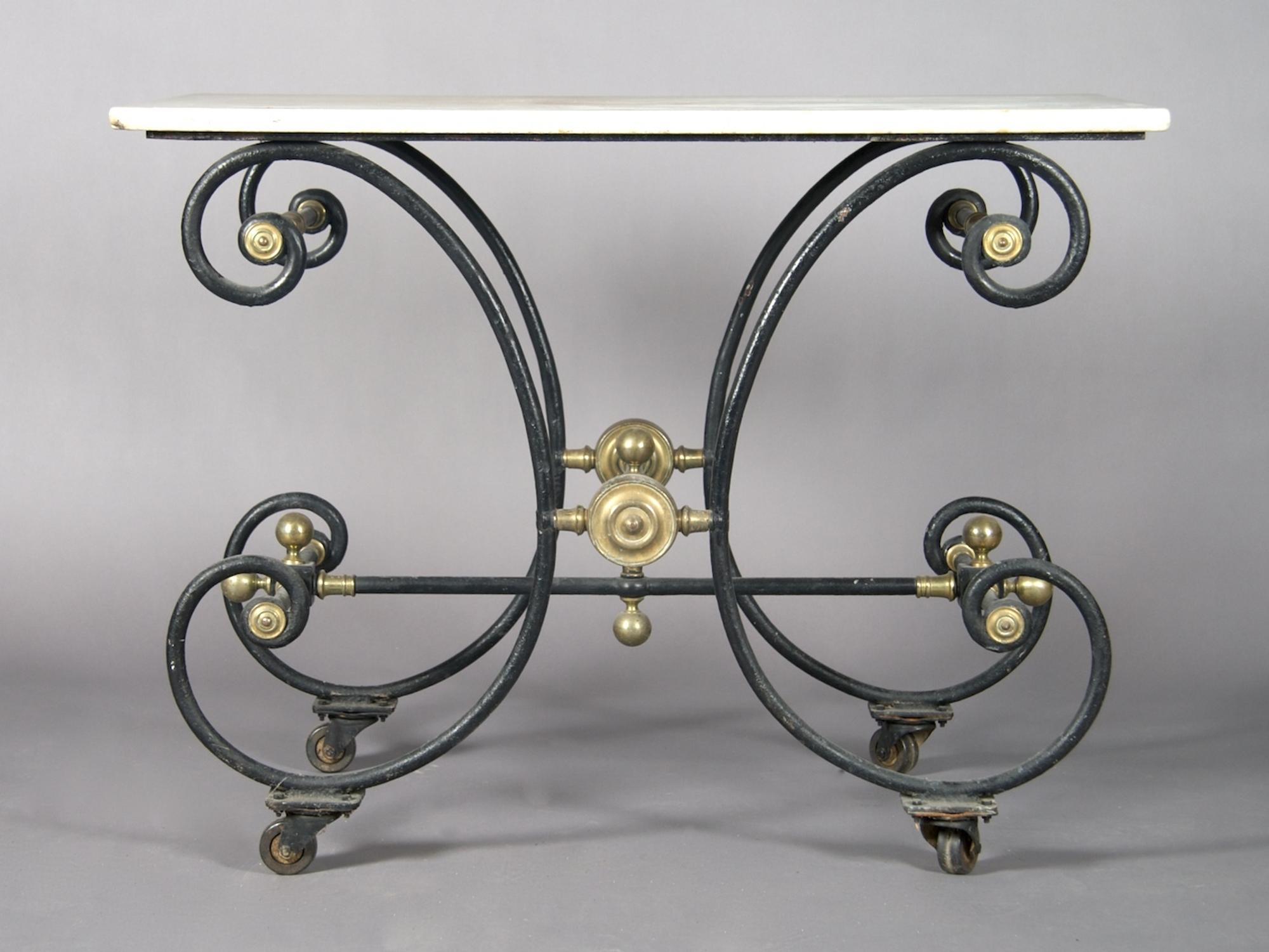 A French Iron and Marble Work Table, Height 33 x width 43 1/4 x depth 23 1/2 inches.