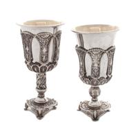 Two Continental Silver Filigree Goblets, Late 19th Century, each with a solid silver liner, raised on a tripartite base.