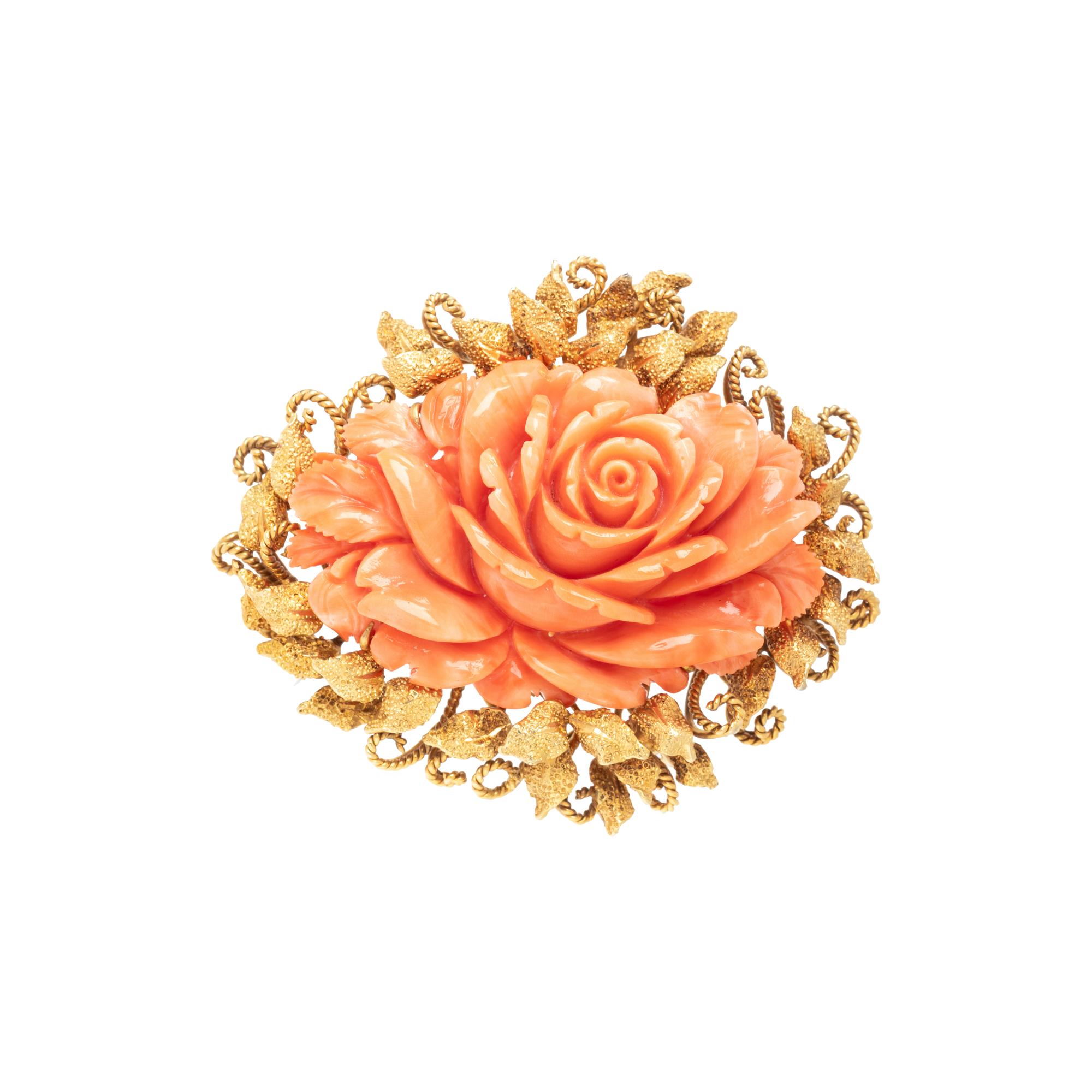 YELLOW GOLD AND CARVED CORAL BROOCH