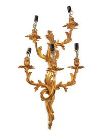 A Set of Four Louis XV Style Gilt Metal Five-Light Sconces
