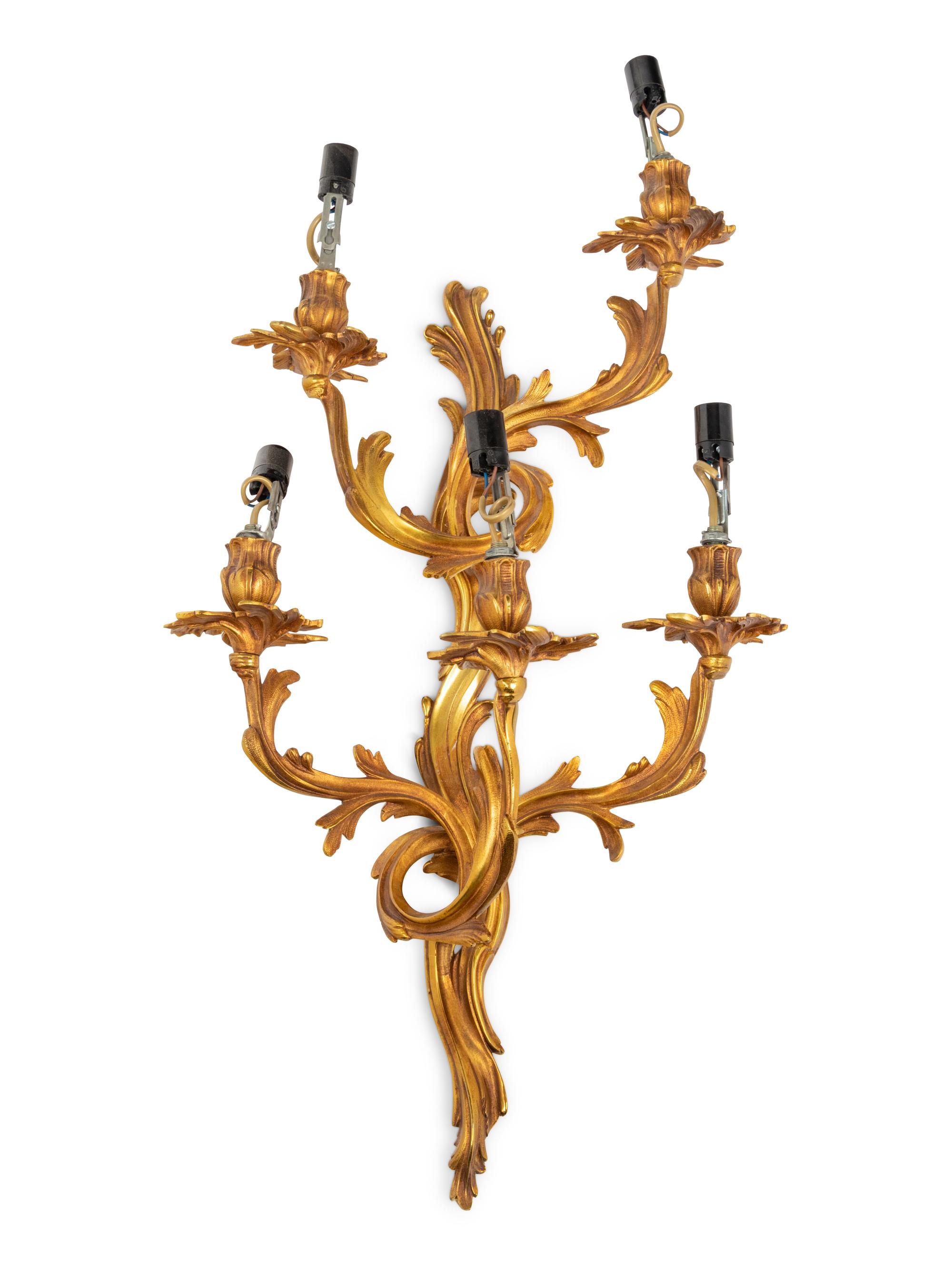 A Set of Four Louis XV Style Gilt Metal Five-Light Sconces