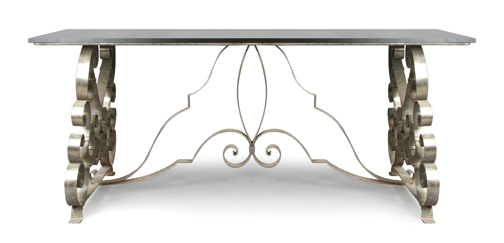 An Art Deco Style Steel and Glass Table, Height 29 1/2 x width 71 x depth 31 inches.