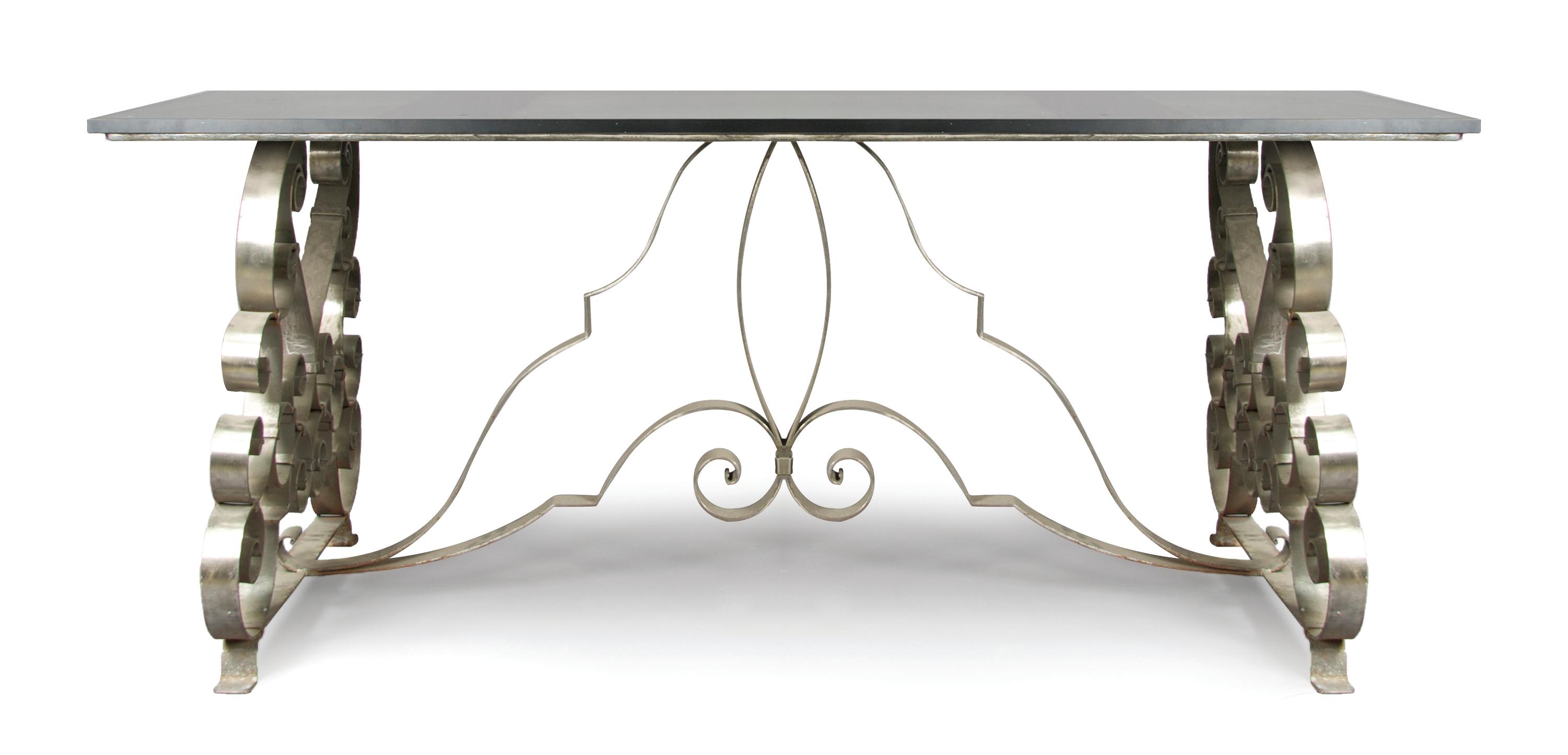 An Art Deco Style Steel and Glass Table, Height 29 1/2 x width 71 x depth 31 inches.