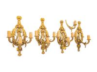 A Set of Four Louis XVI Style Gilt Metal Three-Light Sconces