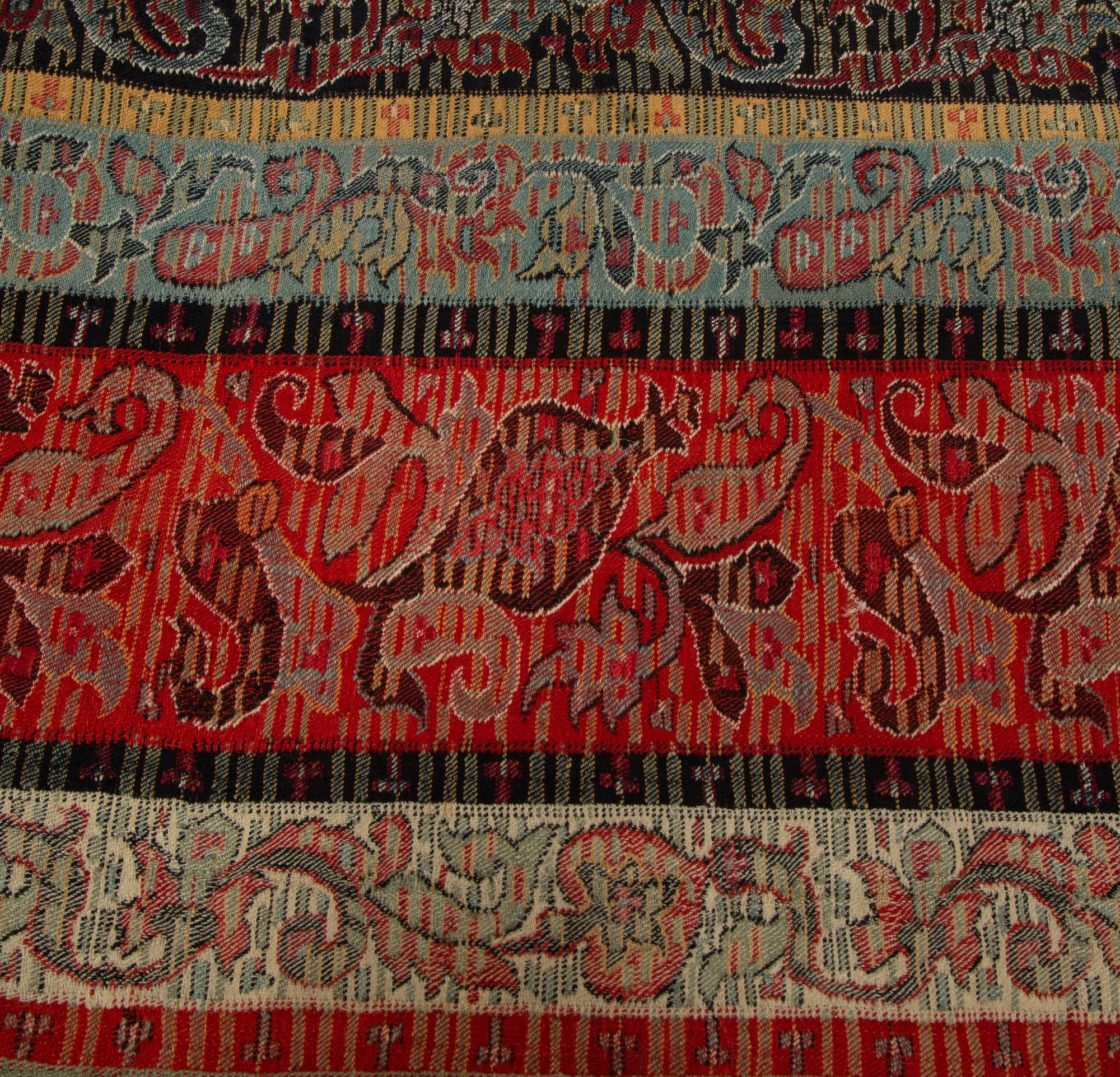 An Indian Paisley Wool Coverlet and Six Pillows
