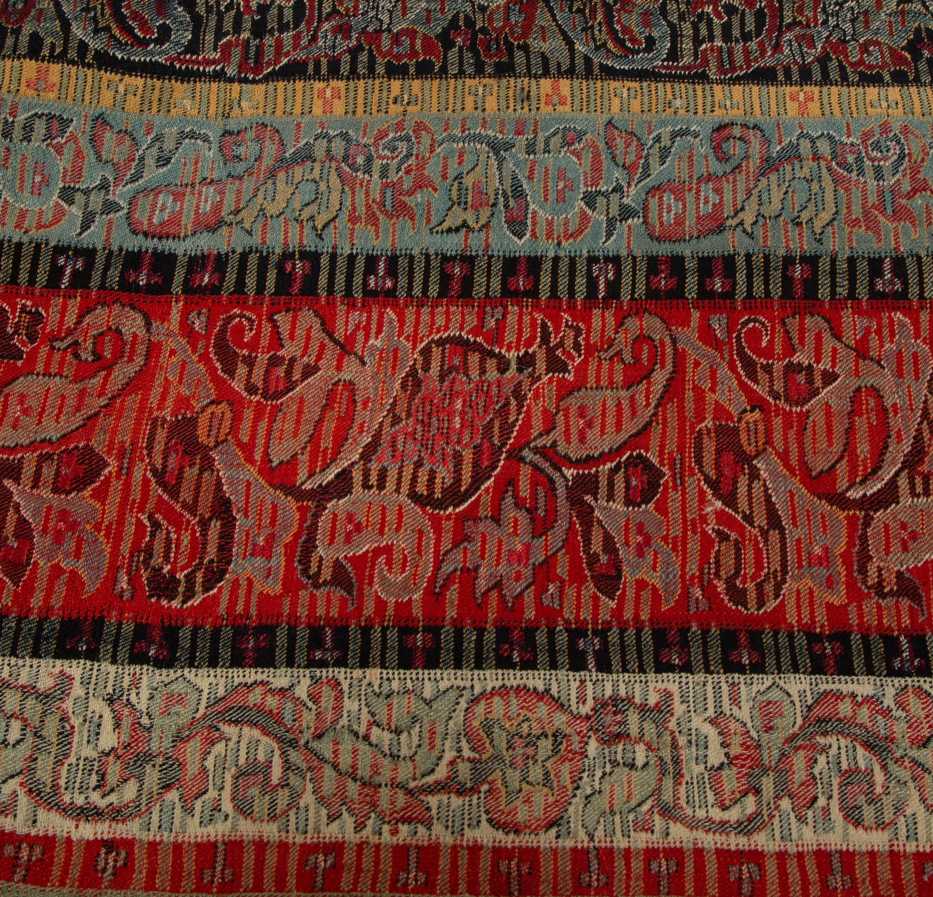 An Indian Paisley Wool Coverlet and Six Pillows