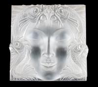 A Lalique Molded and Frosted Glass Figurine Mask on Stand Height 14 x width 14 inches.