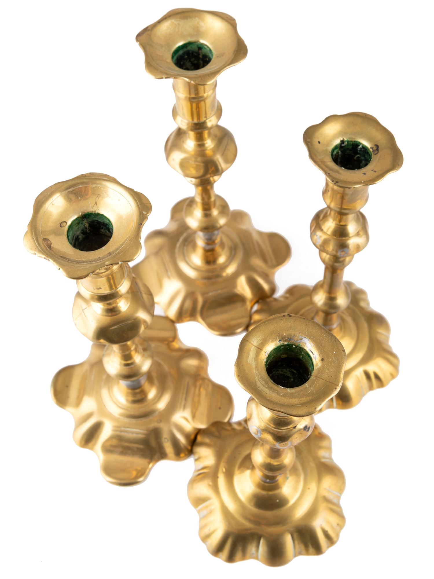Two Pairs of English Brass Candlesticks