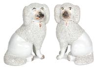 A Pair of English Painted Ceramic Figurines Height 7 inches. — 19TH CENTURY