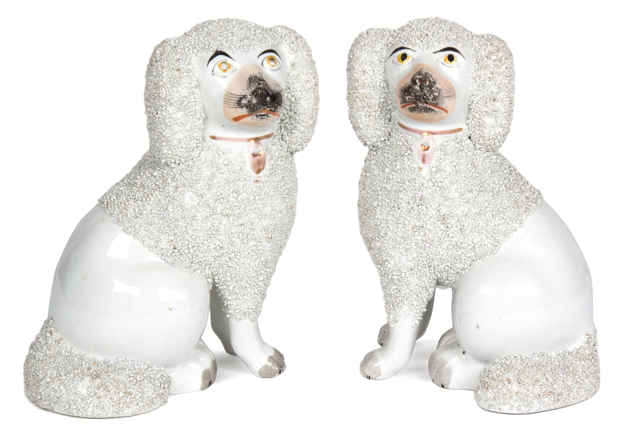 A Pair of English Painted Ceramic Figurines Height 7 inches. — 19TH CENTURY