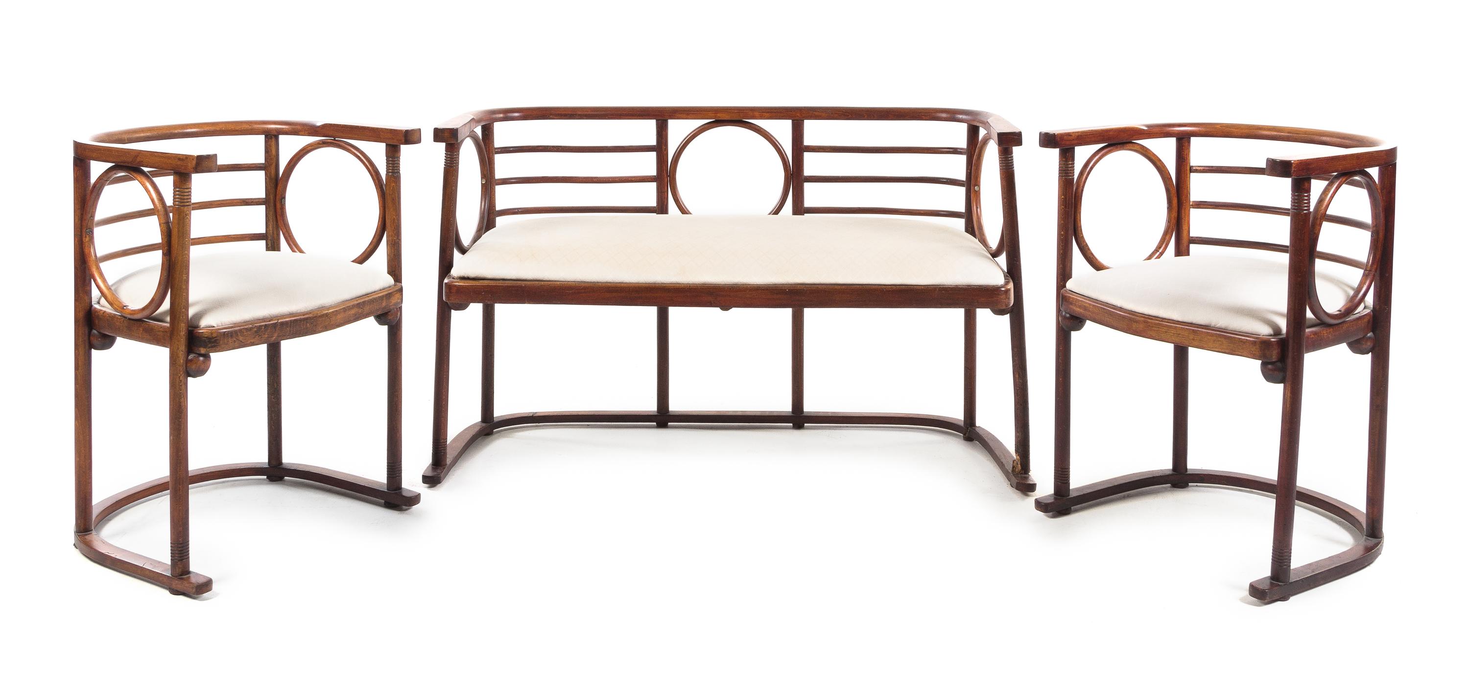 Attributed to Josef Hoffmann, Austria, c.1905, a four-piece salon suite comprising a settee, two armchairs and a side table