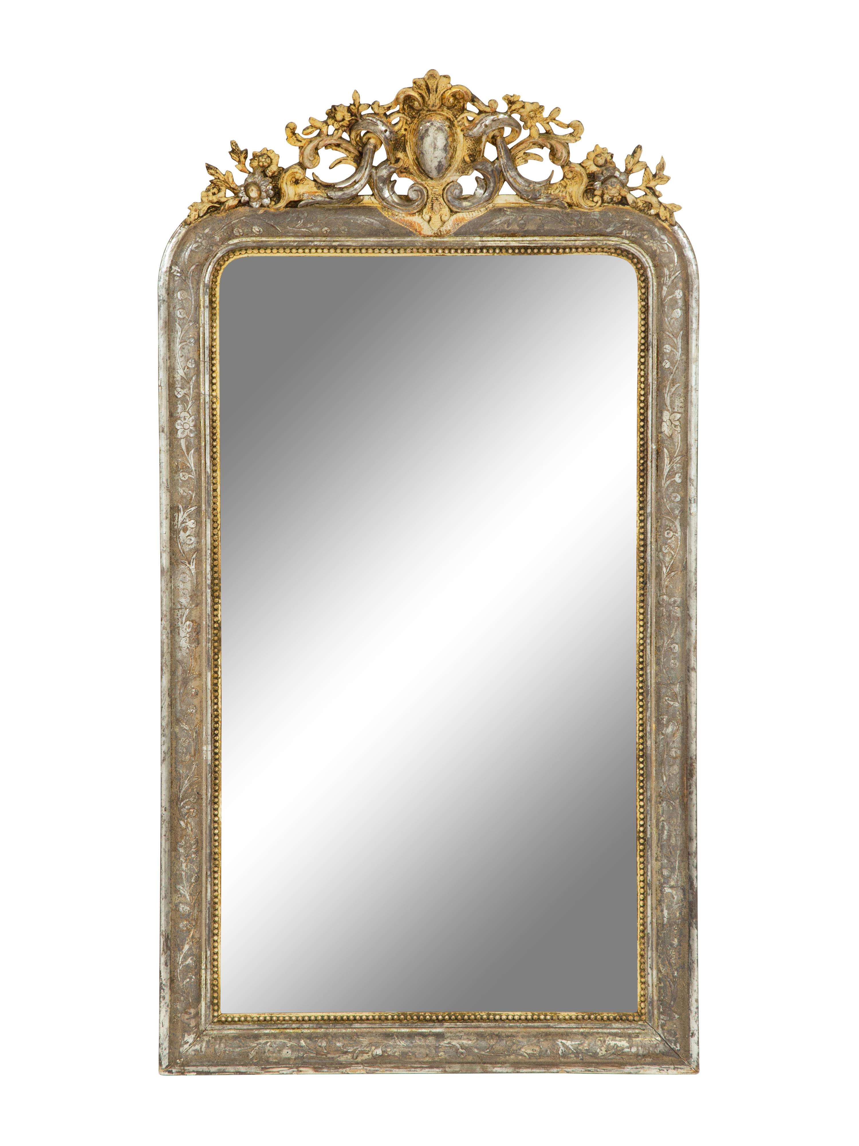 A Napoleon III Silvered and Gilt Wood Mirror