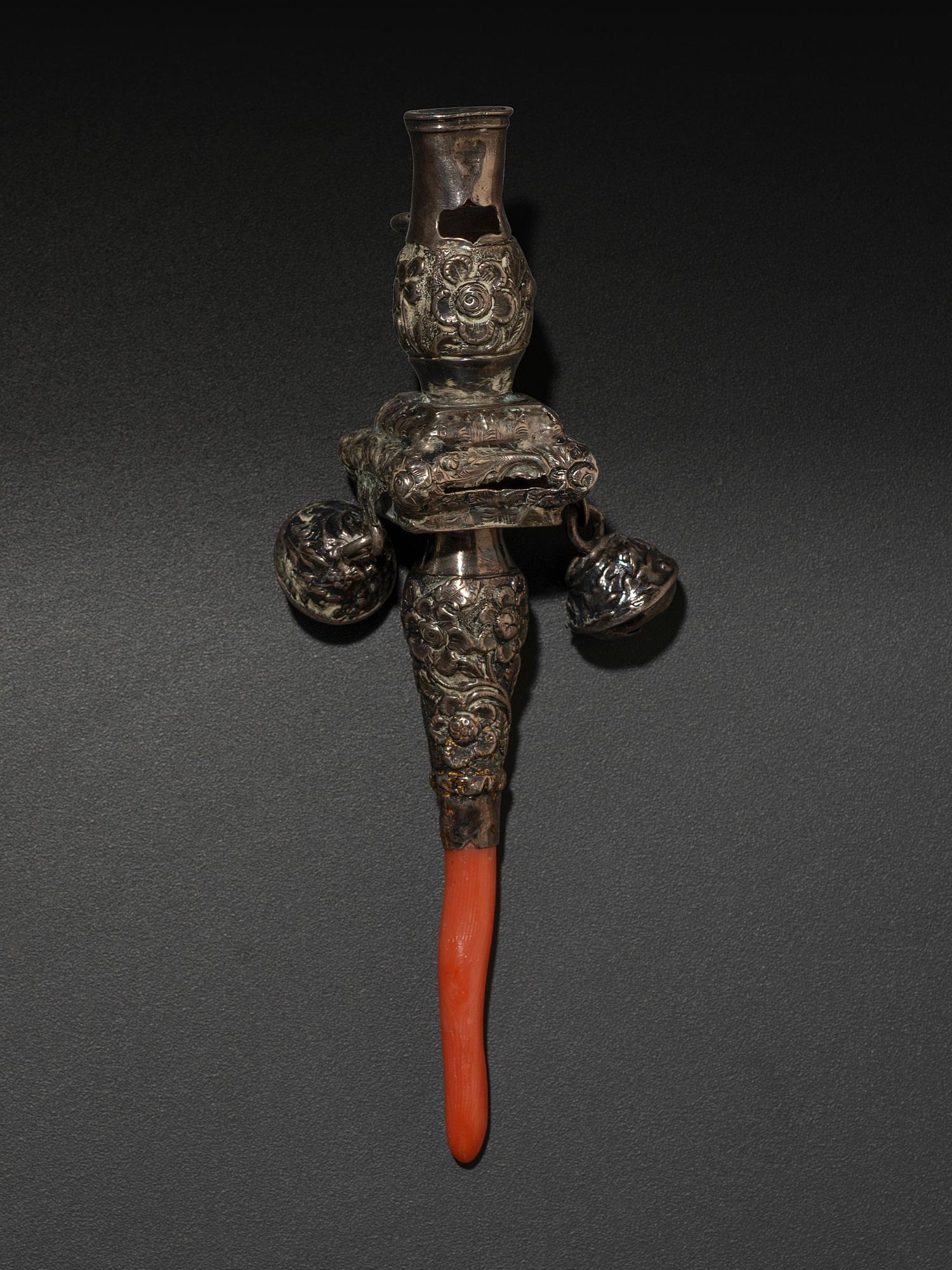 A Silver and Coral Mounted Child's Rattle Whistle