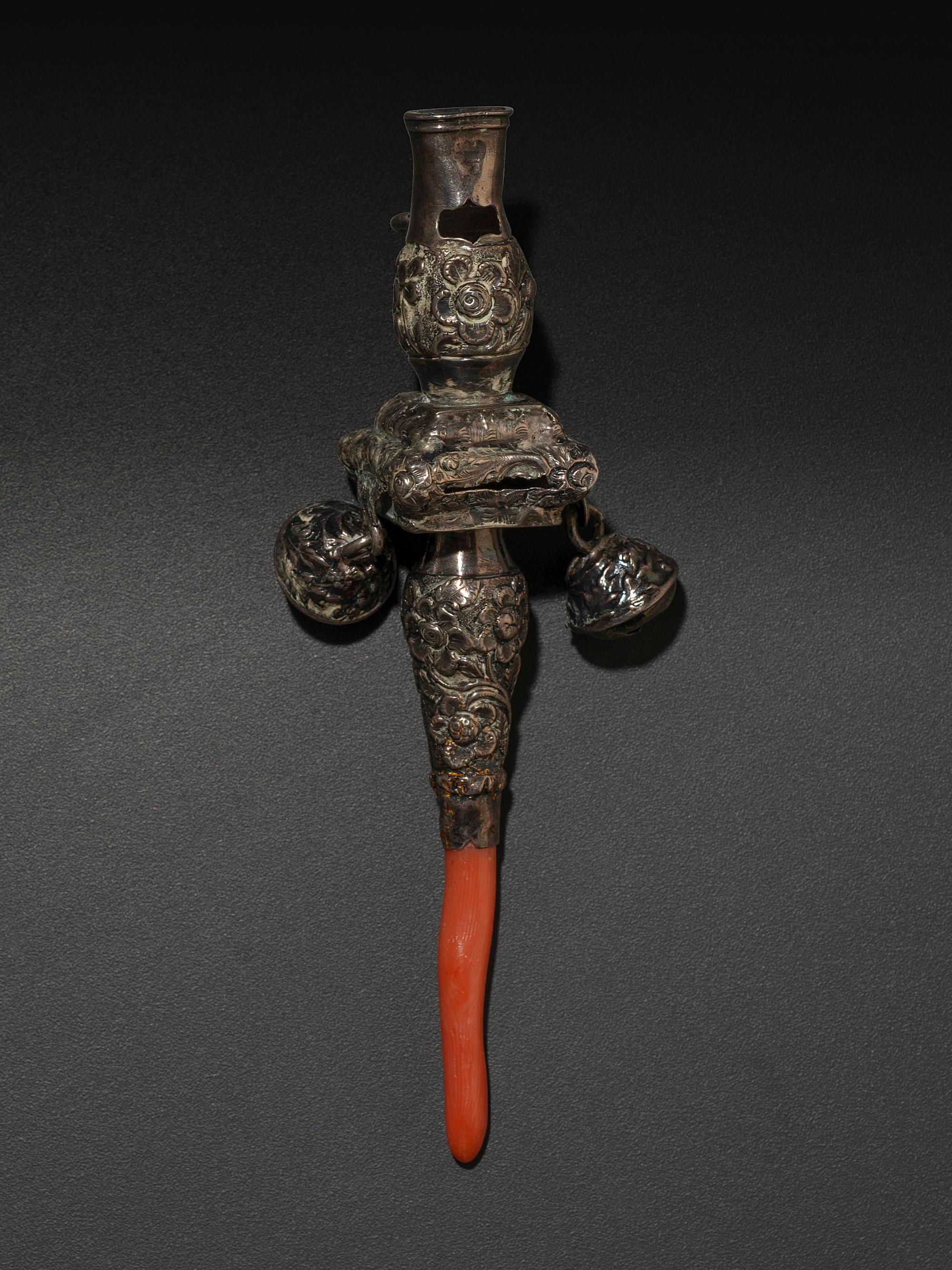 A Silver and Coral Mounted Child's Rattle Whistle