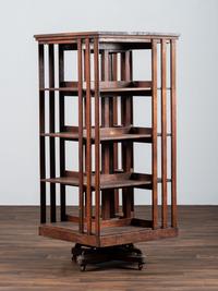 A Country Store Iron-Mounted Oak Rotating Bookshelf