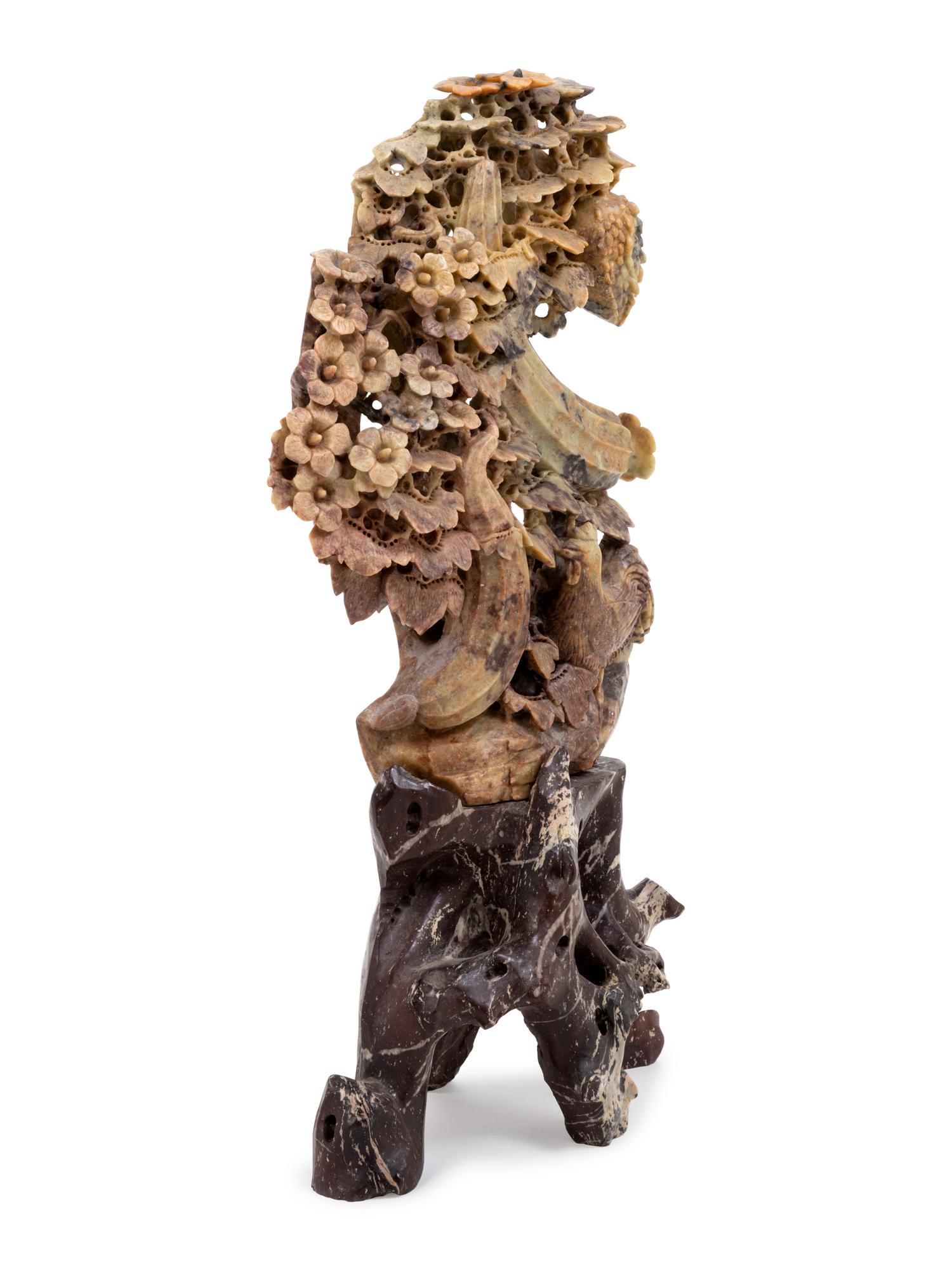 A Chinese Carved Soapstone Figural Group