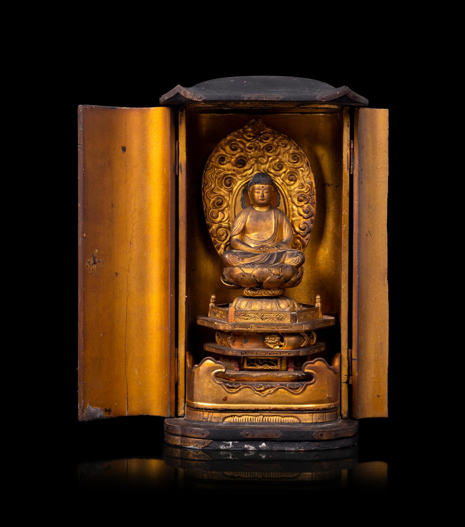 A Japanese Gilt Lacquered Figure of Buddha