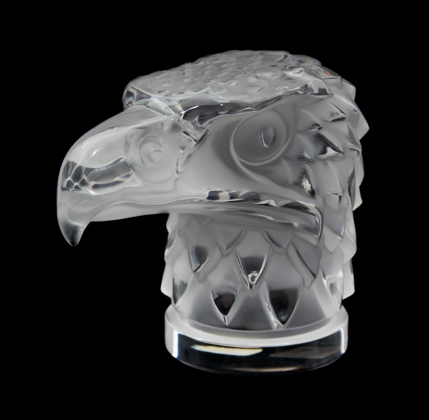 A Lalique Molded and Frosted Glass Tete D'Aigle Height 4 1/2 inches. — 20TH CENTURY
