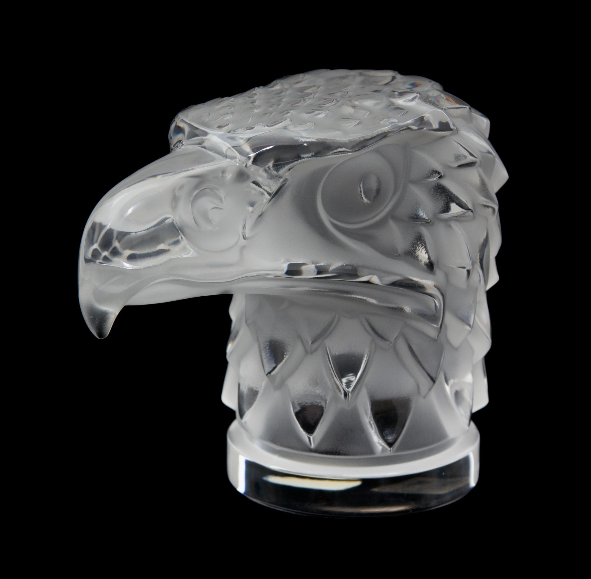 A Lalique Molded and Frosted Glass Tete D'Aigle Height 4 1/2 inches. — 20TH CENTURY