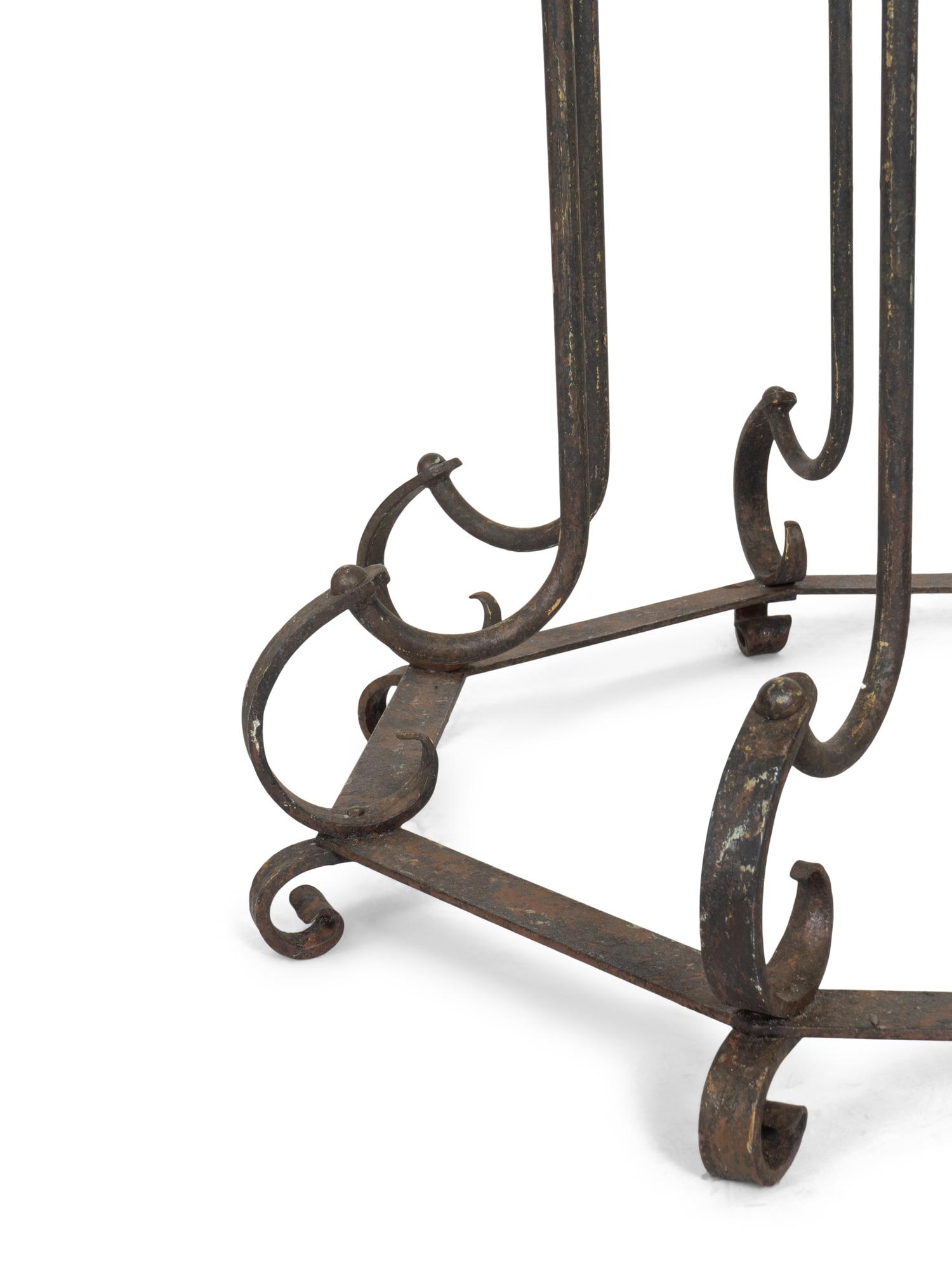 A Large Spanish Revival Style Wrought Iron Pedestal Table