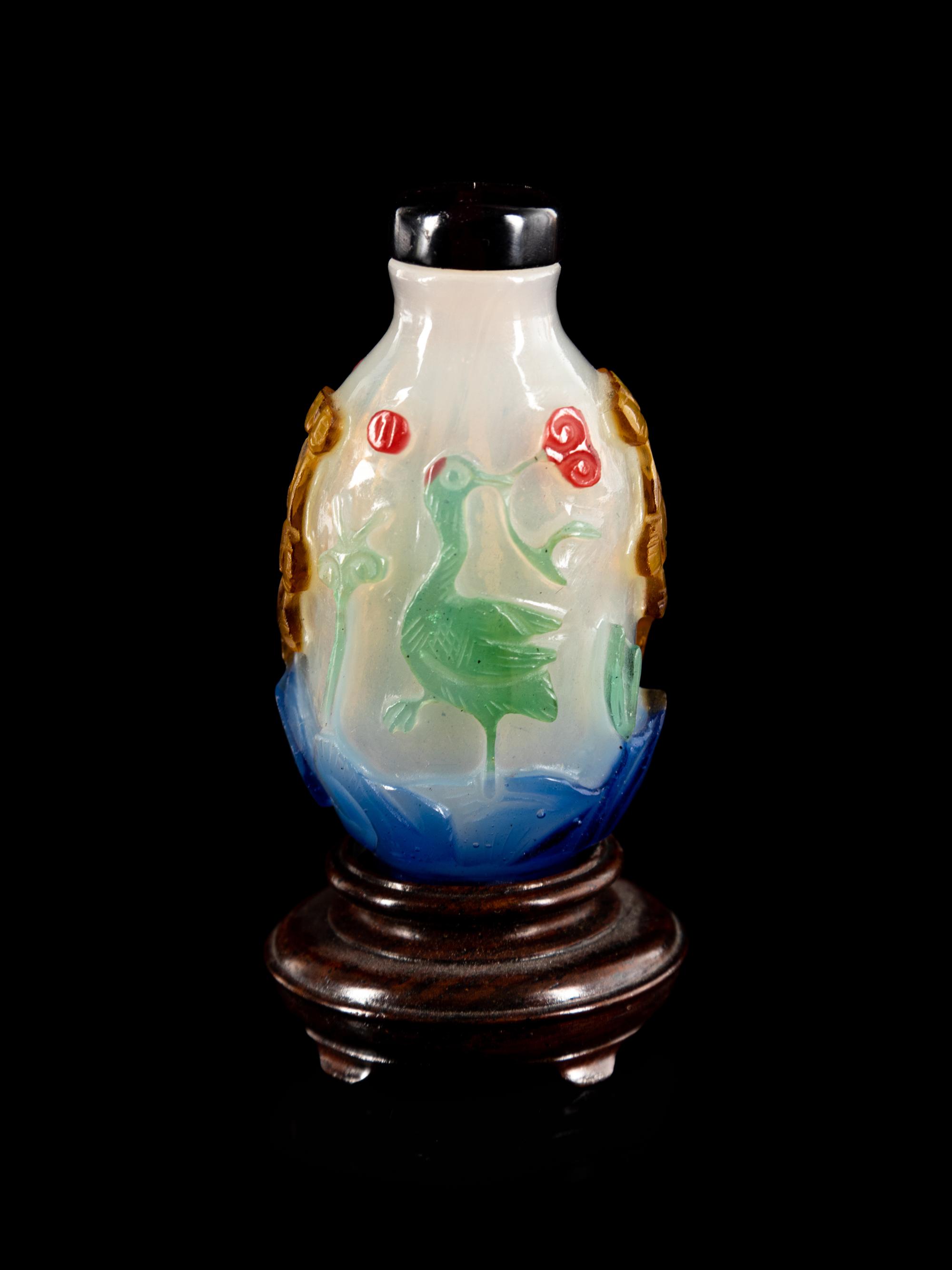A Chinese Multi-Colored Overlay Translucent White Peking Glass Snuff Bottle