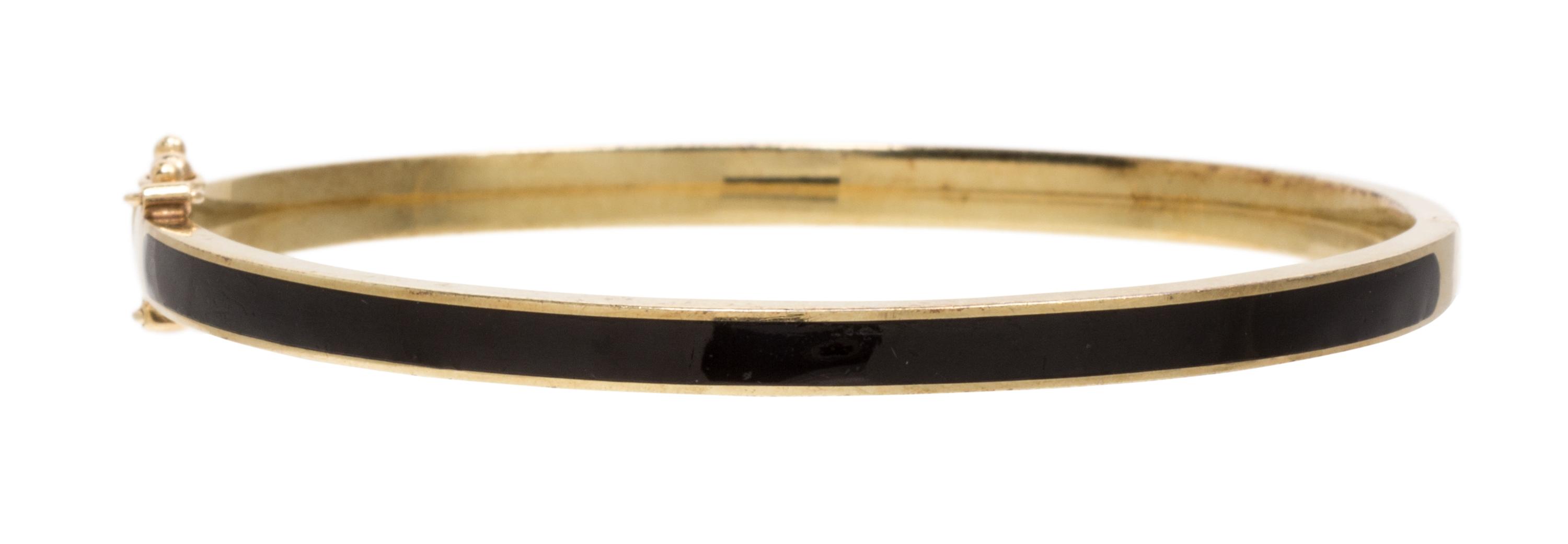 A Yellow Gold and Enamel Bangle Bracelet, 6.10 dwts.