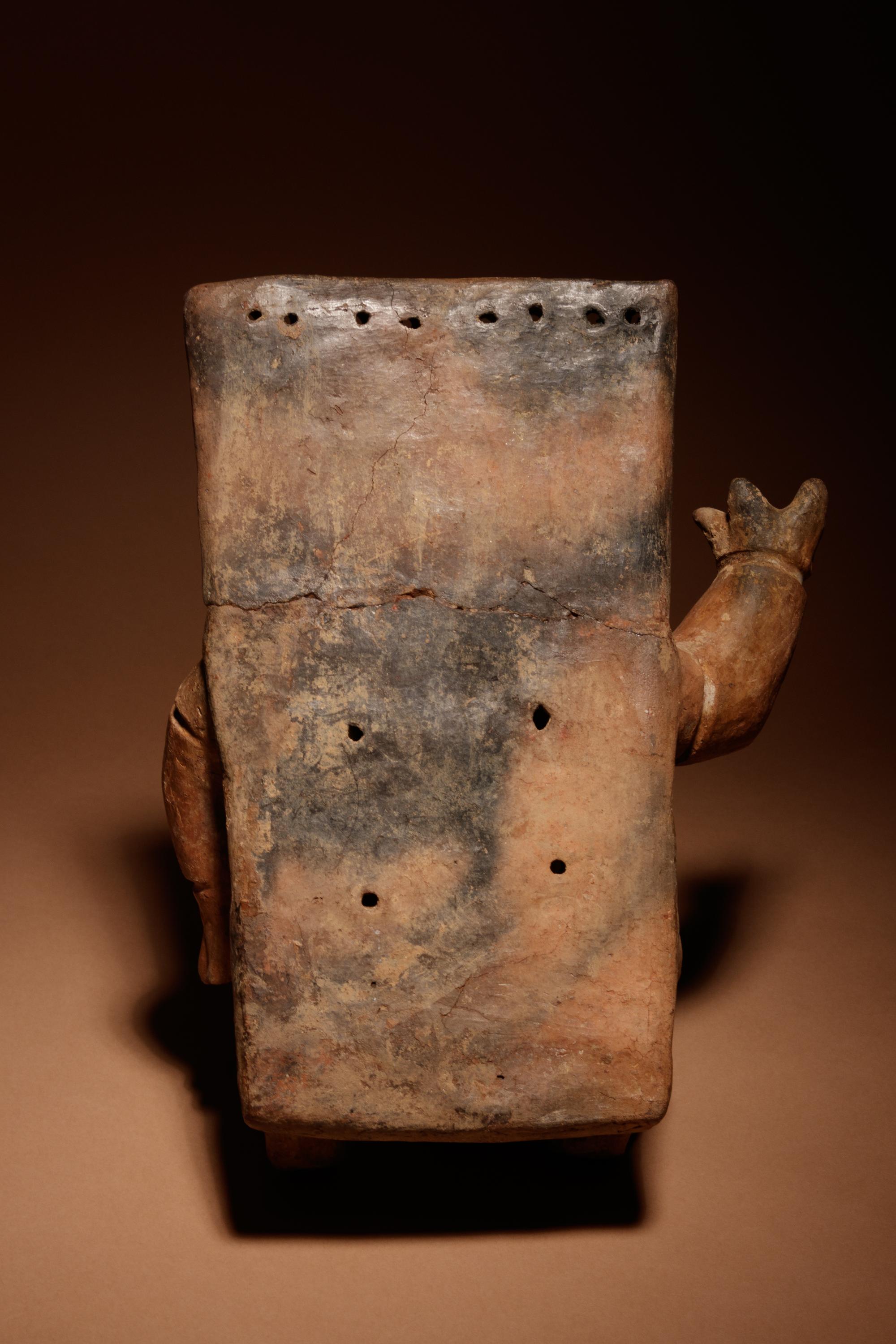 A Quimbaya Terracotta Seated Figure