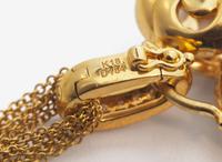 A Yellow Gold and Diamond Heart Necklace
