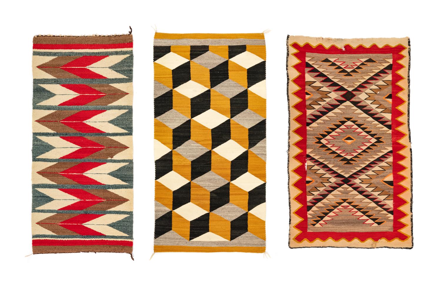 A Group of Navajo Weavings and Rugs