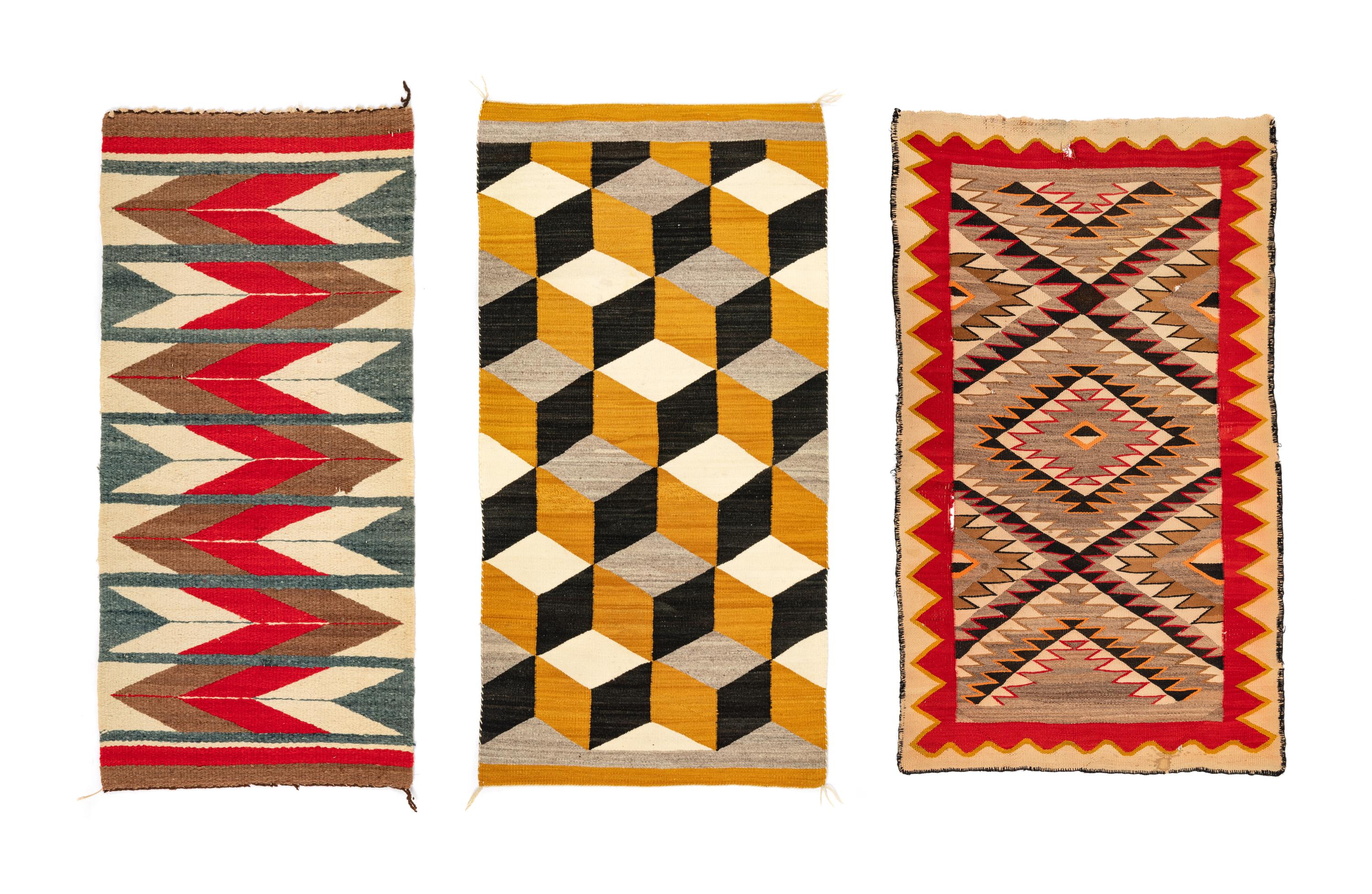 A Group of Navajo Weavings and Rugs