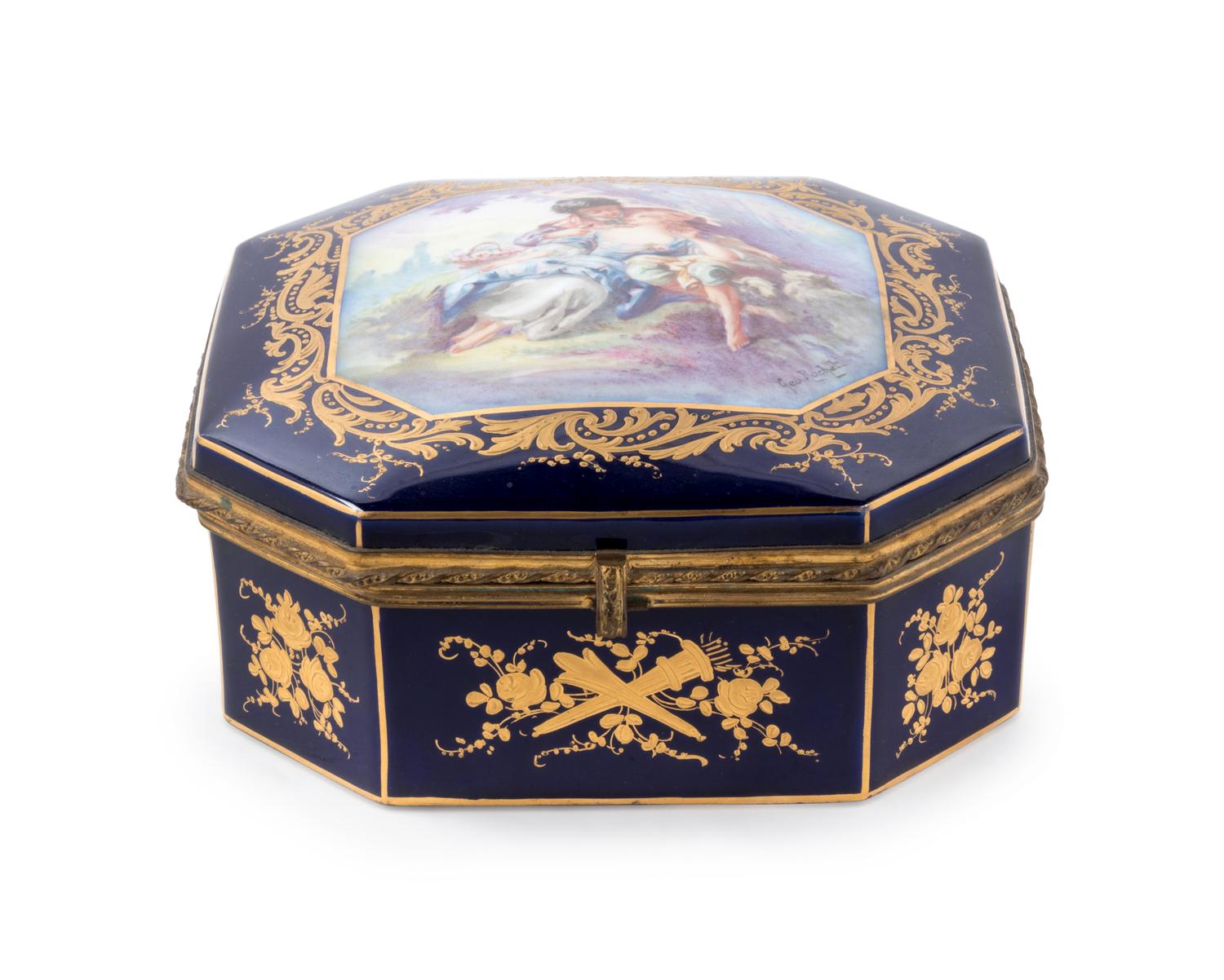 A Sèvres Style Painted and Parcel Gilt Porcelain Table Casket
