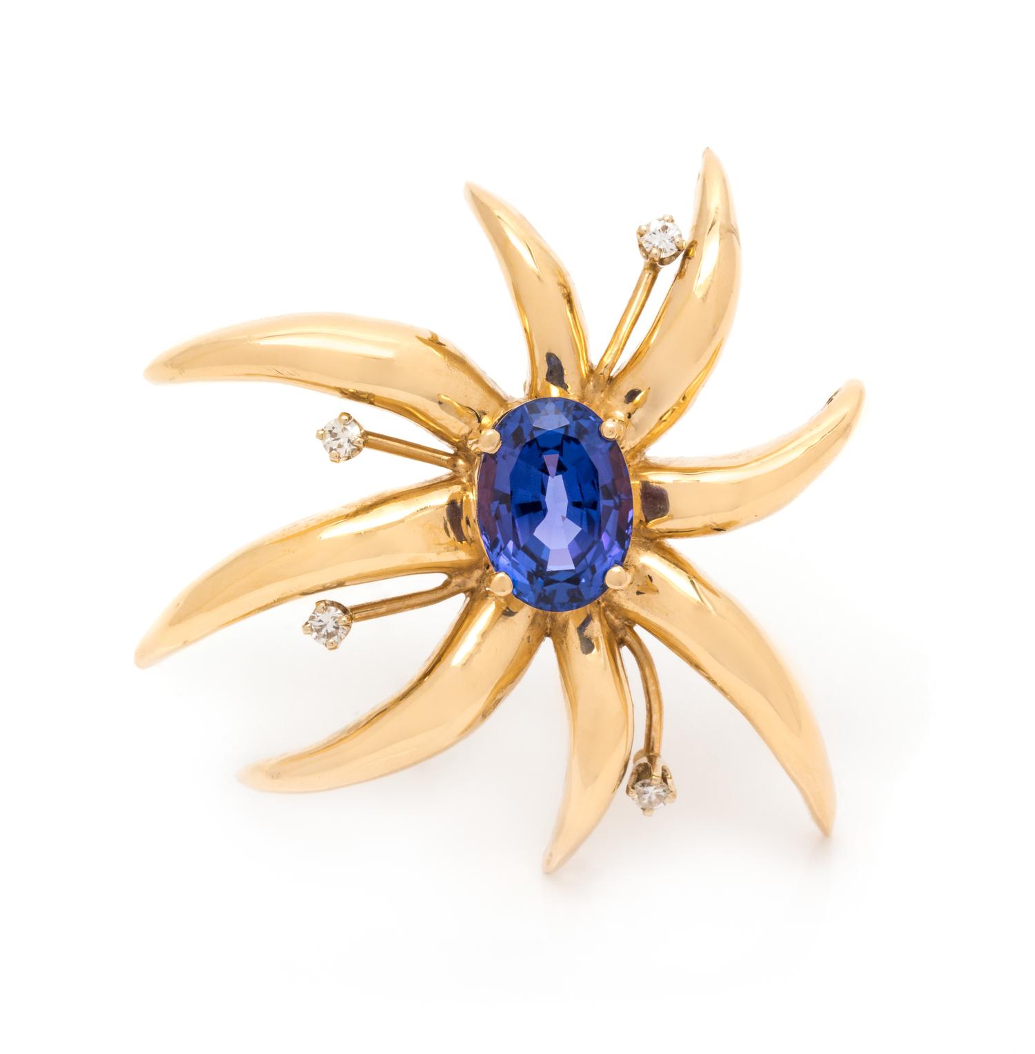 A Yellow Gold, Tanzanite and Diamond Starburst Brooch, 18.30 dwts.