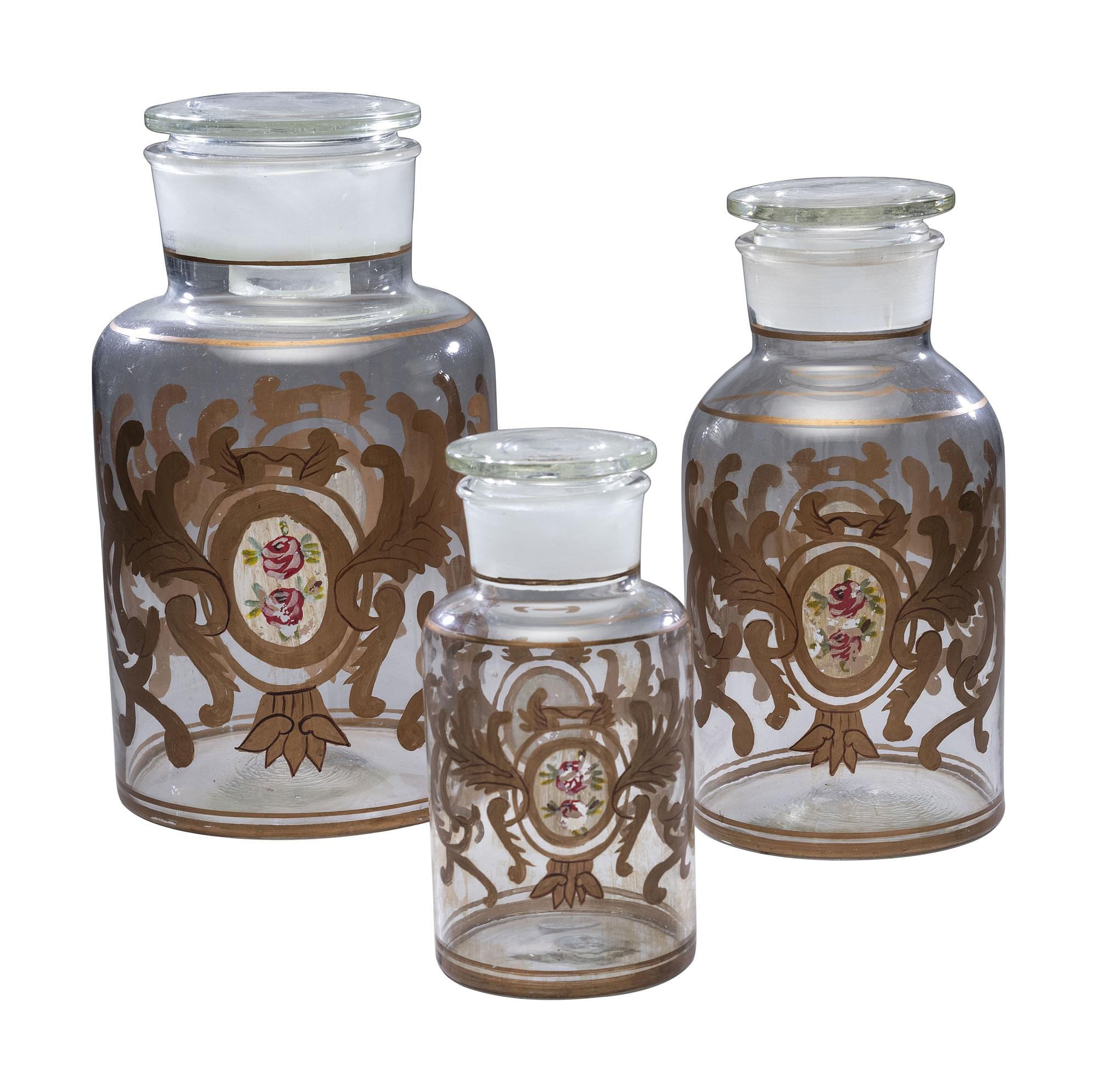 Three Graduated Paint and Gilt Decorated Glass Storage Jars