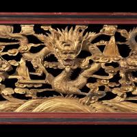 A Chinese Gilt Lacquered Wood 'Dragons' Openwork Panel 木漆金龍紋鏤雕花板