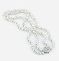 An 18K white gold, cultured pearl and diamond necklace, Mikimoto