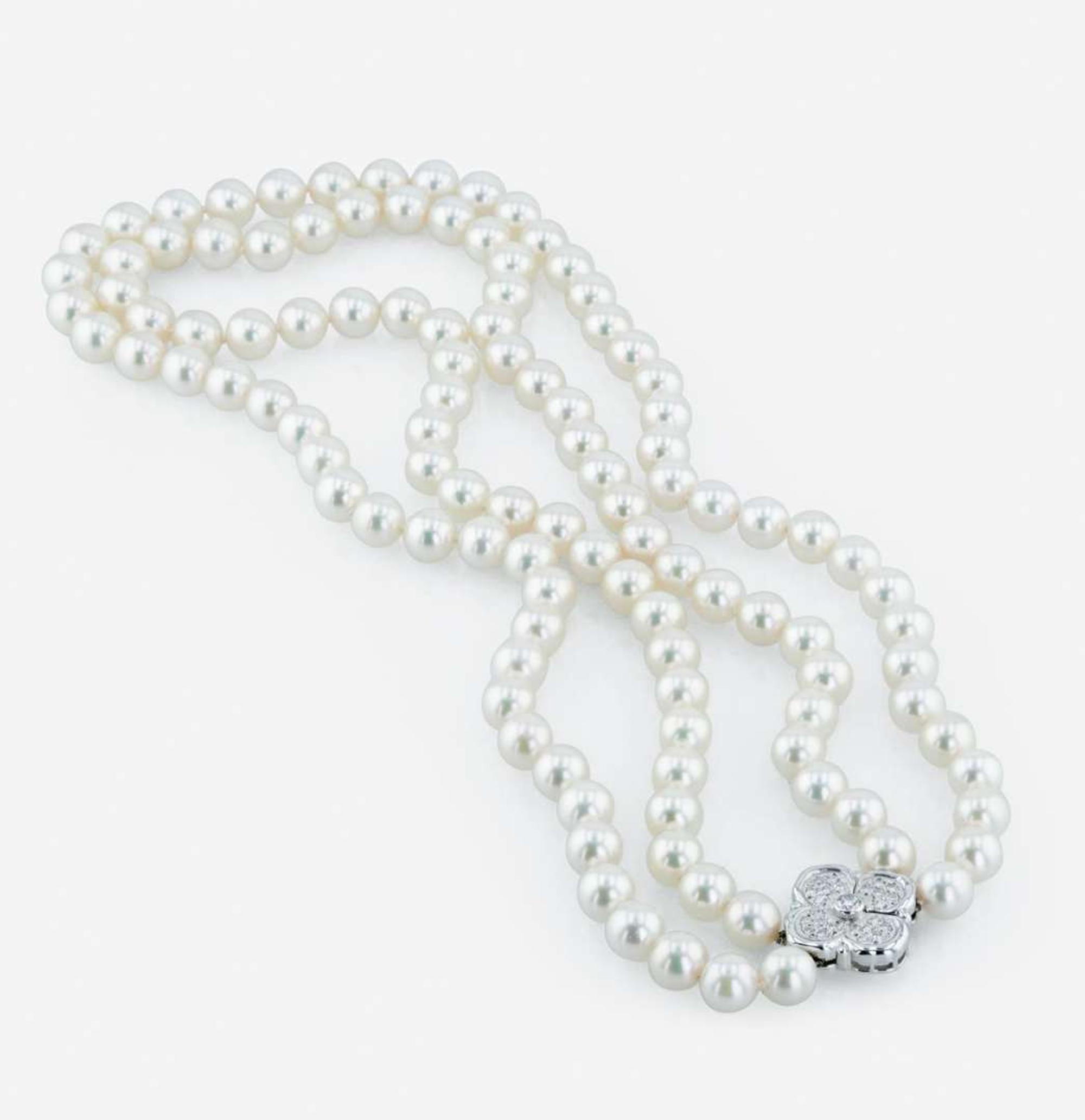 An 18K white gold, cultured pearl and diamond necklace, Mikimoto