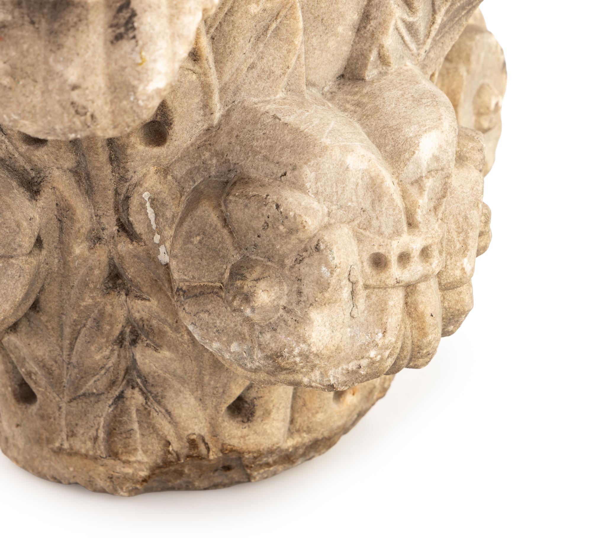 An Italian Carved Stone Capital From Palazzo Odescalchi