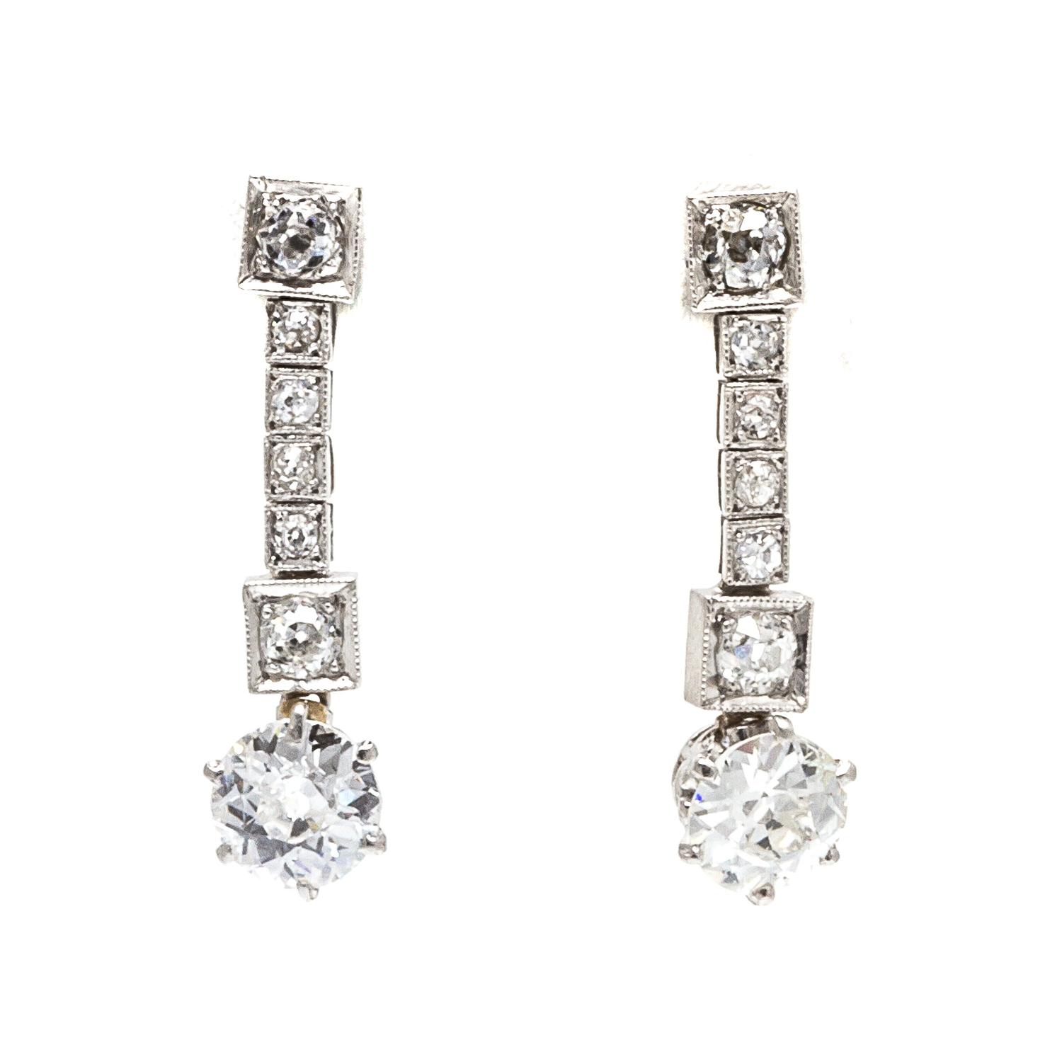 A Pair of Art Deco Platinum and Diamond Earrings, 2.60 dwts.