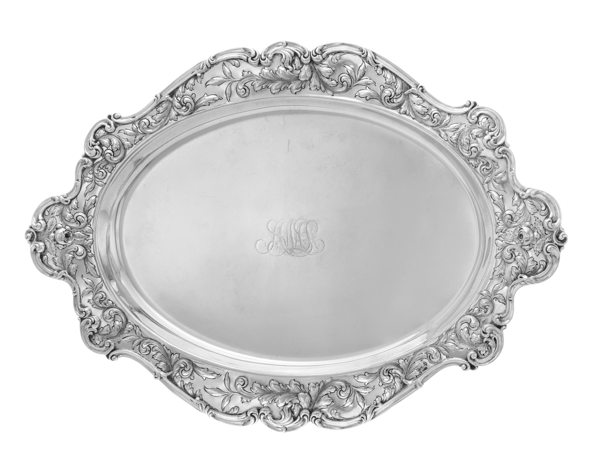 An American Silver Serving Tray, Gorham Mfg. Co., Providence, RI, 1902, the oval platter with an undulating rim decorated with repousse