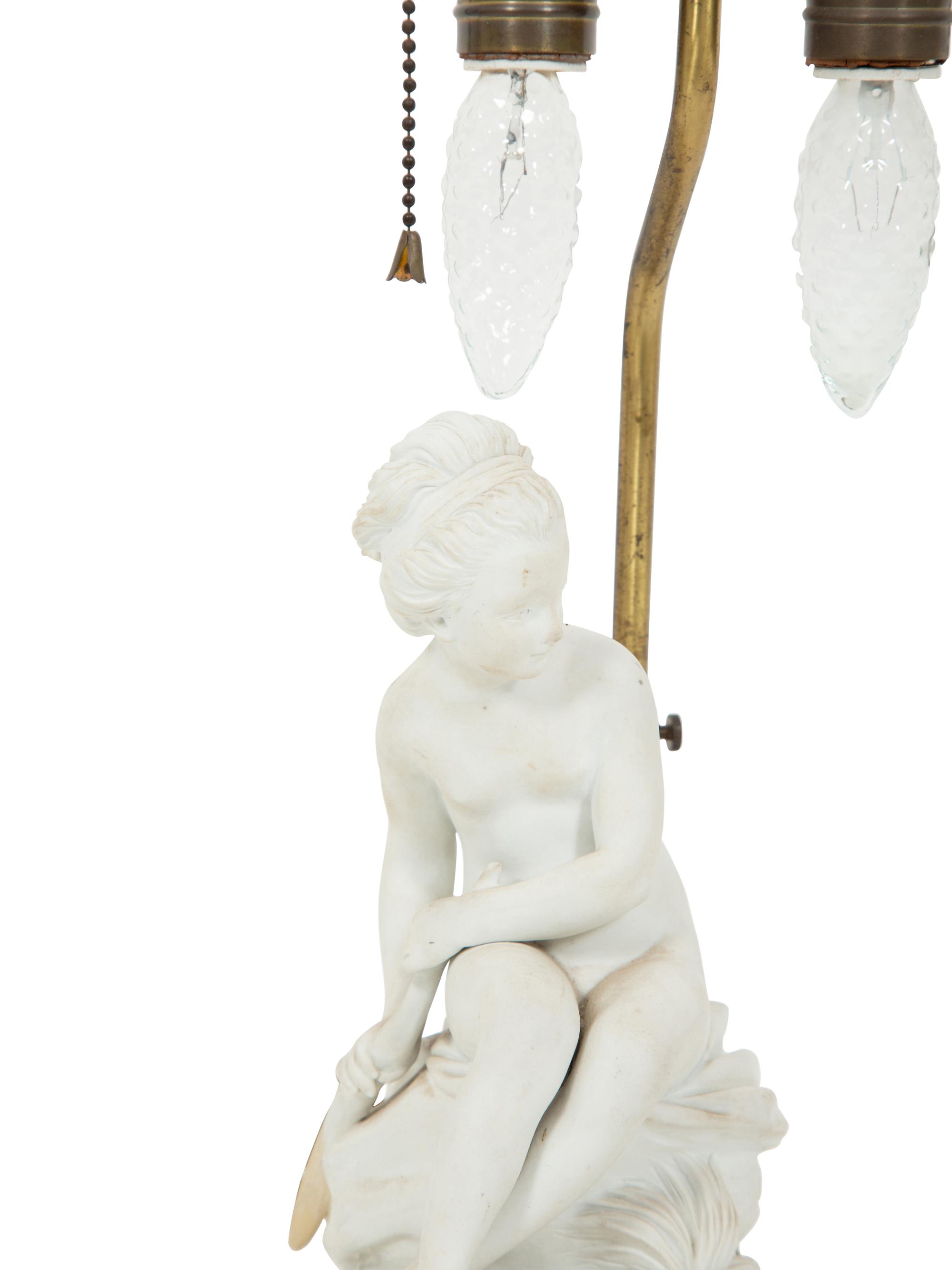 A French Biscuit Porcelain Group Mounted as a Lamp