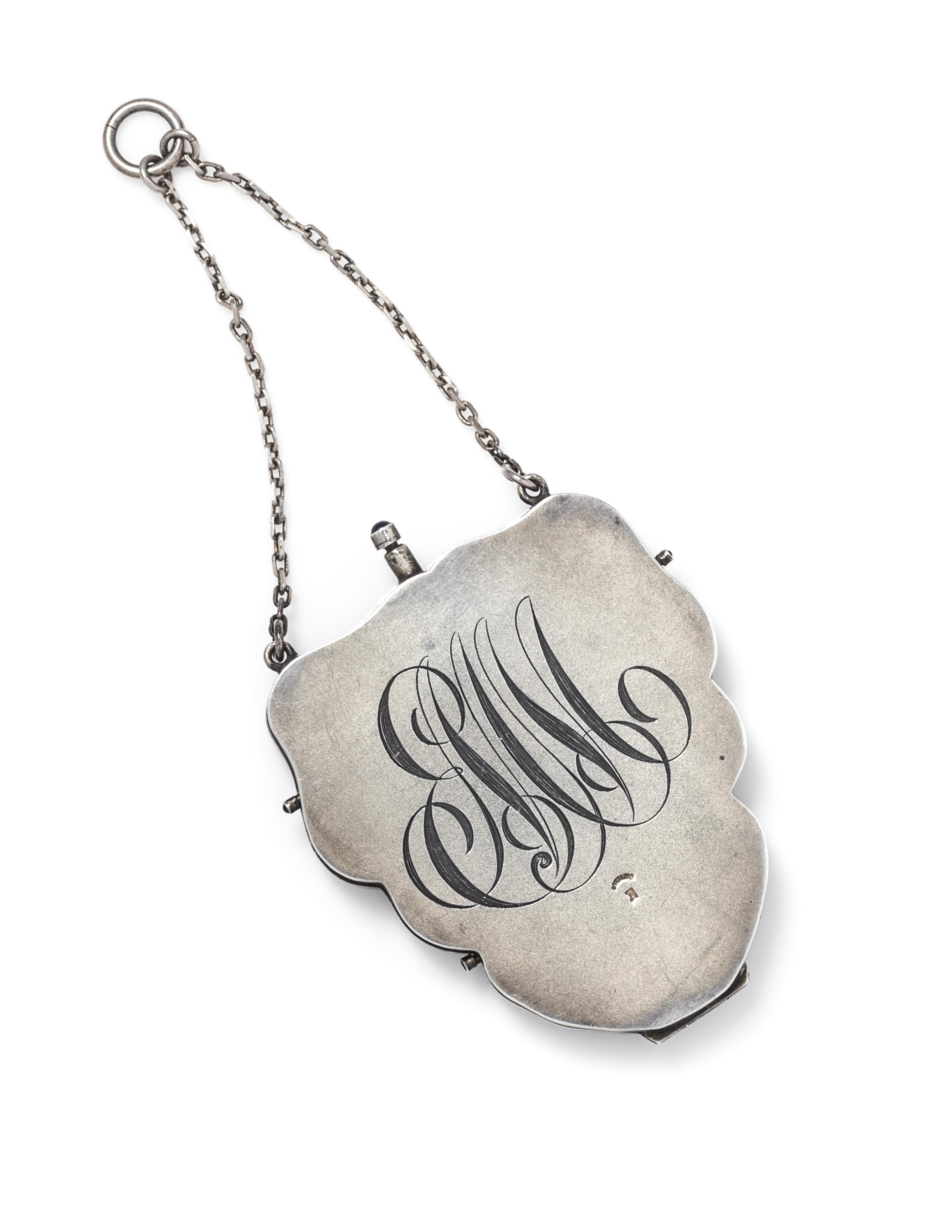 An Art Nouveau Sterling Silver, Plique-a-Jour Polychrome Enamel and Paste Necessaire, 73.60 dwts.
