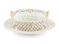 A Chinese Export Armorial Porcelain Reticulated Basket and Underplate
