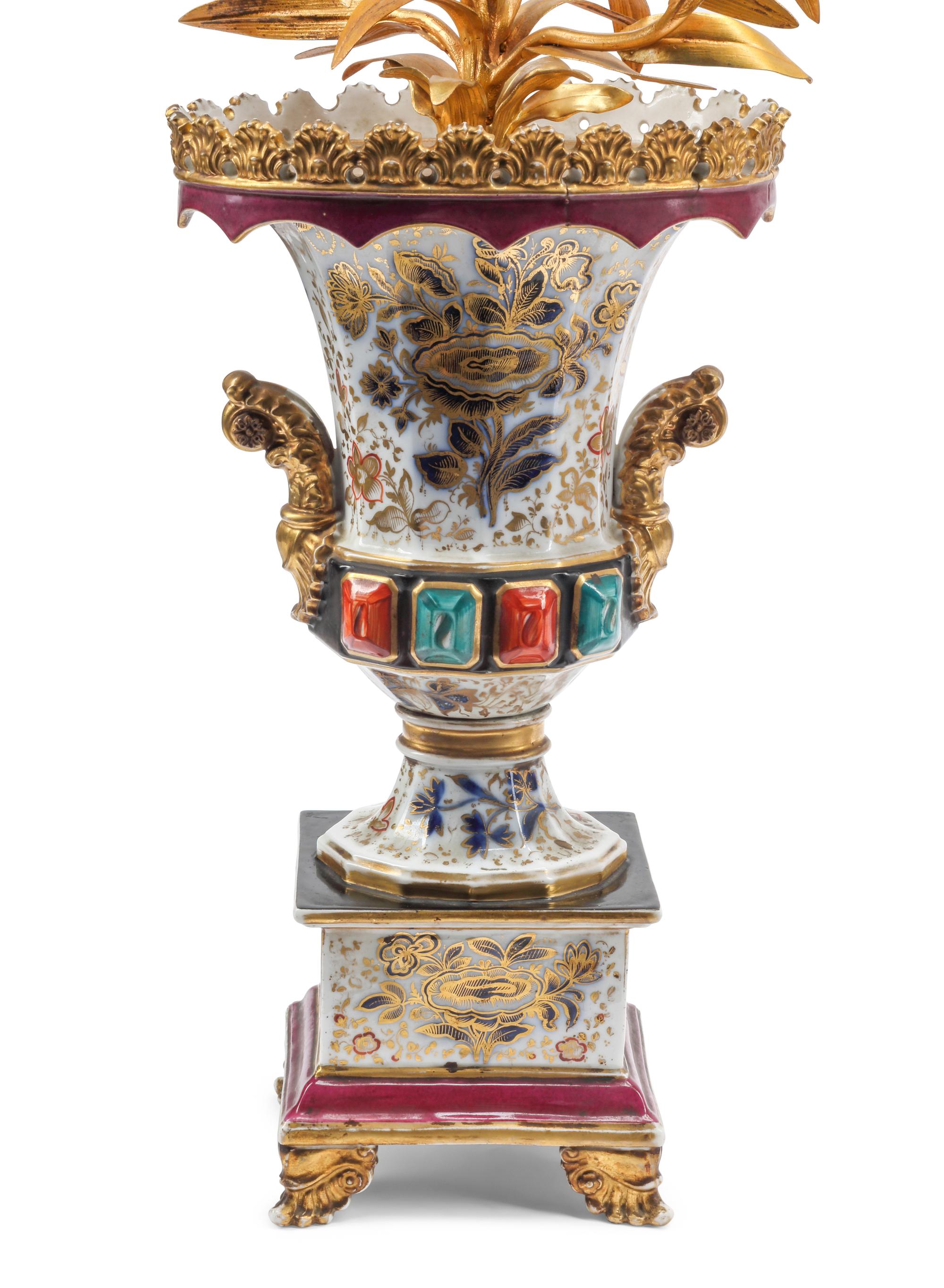 A Pair of Porcelain and Gilt Metal Four-Light Candelabra
