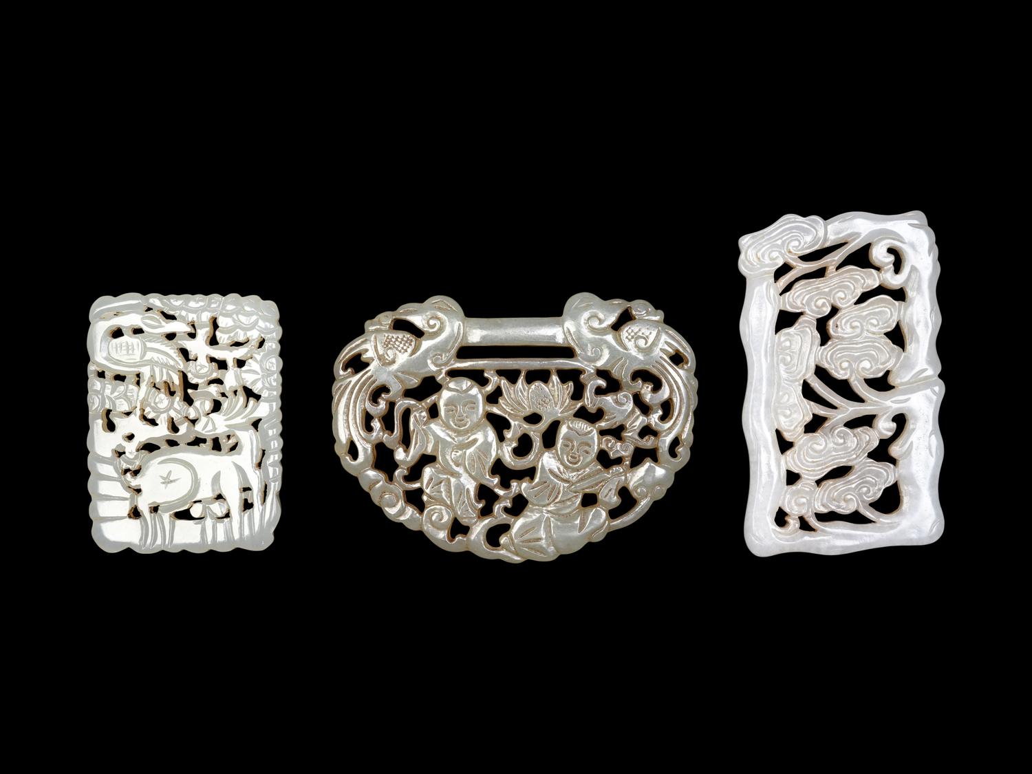 Three Chinese Carved and Reticulated Jade Plaques