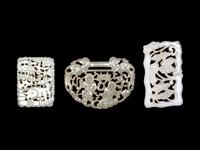 Three Chinese Carved and Reticulated Jade Plaques