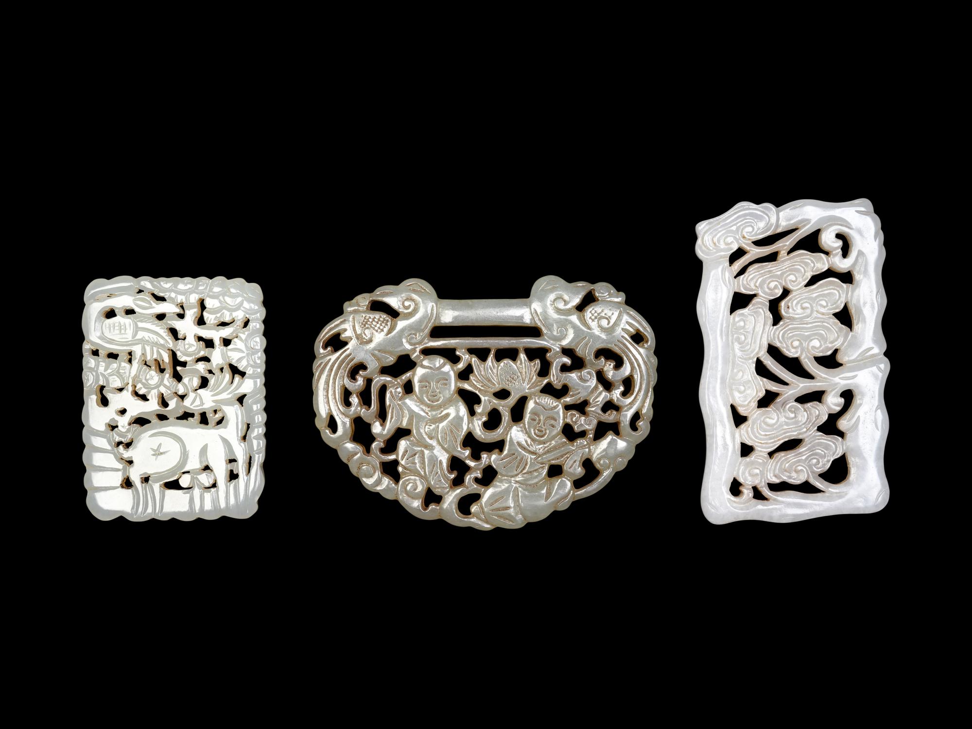 Three Chinese Carved and Reticulated Jade Plaques