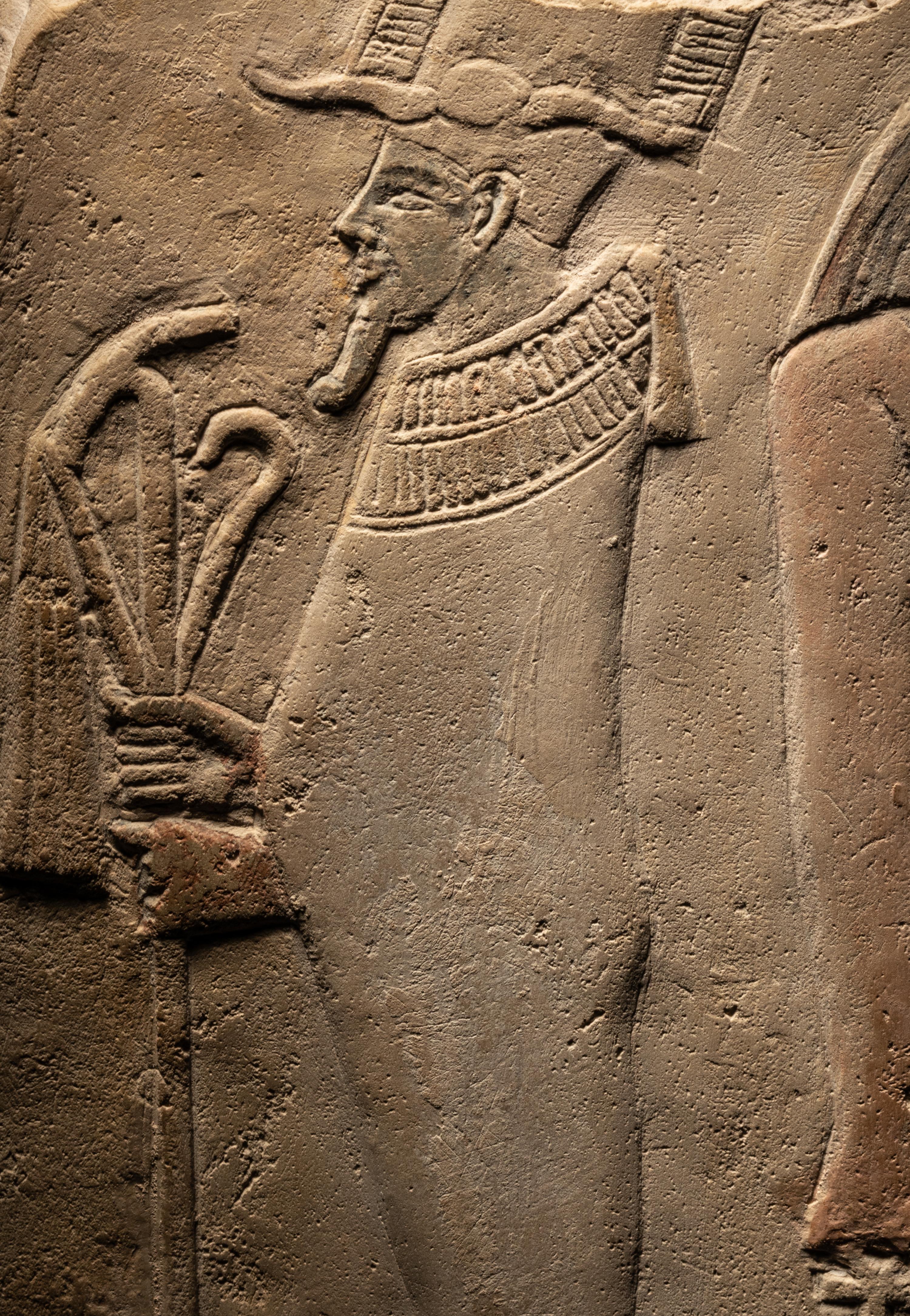 An Egyptian Limestone Round-Topped Stele