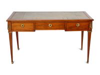 A French Gilt Bronze Mounted Mahogany Bureau Plat