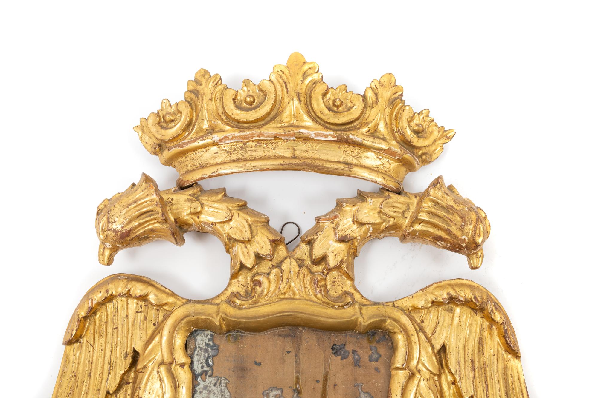 A Pair of Continental Giltwood Mirrors